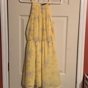 Yellow cinch waist sundress.